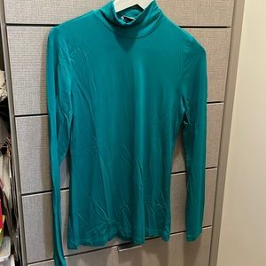 Babaton turtleneck sweater.